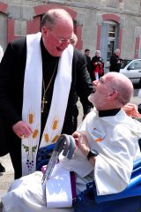 2011 Lourdes Pilgrimage - Archbishop Dolan with Malades (138/267)